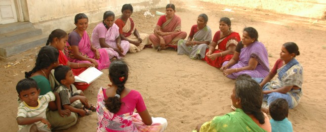 A group of women gather for a self help group meeting 