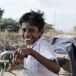 Children in India often bike to school